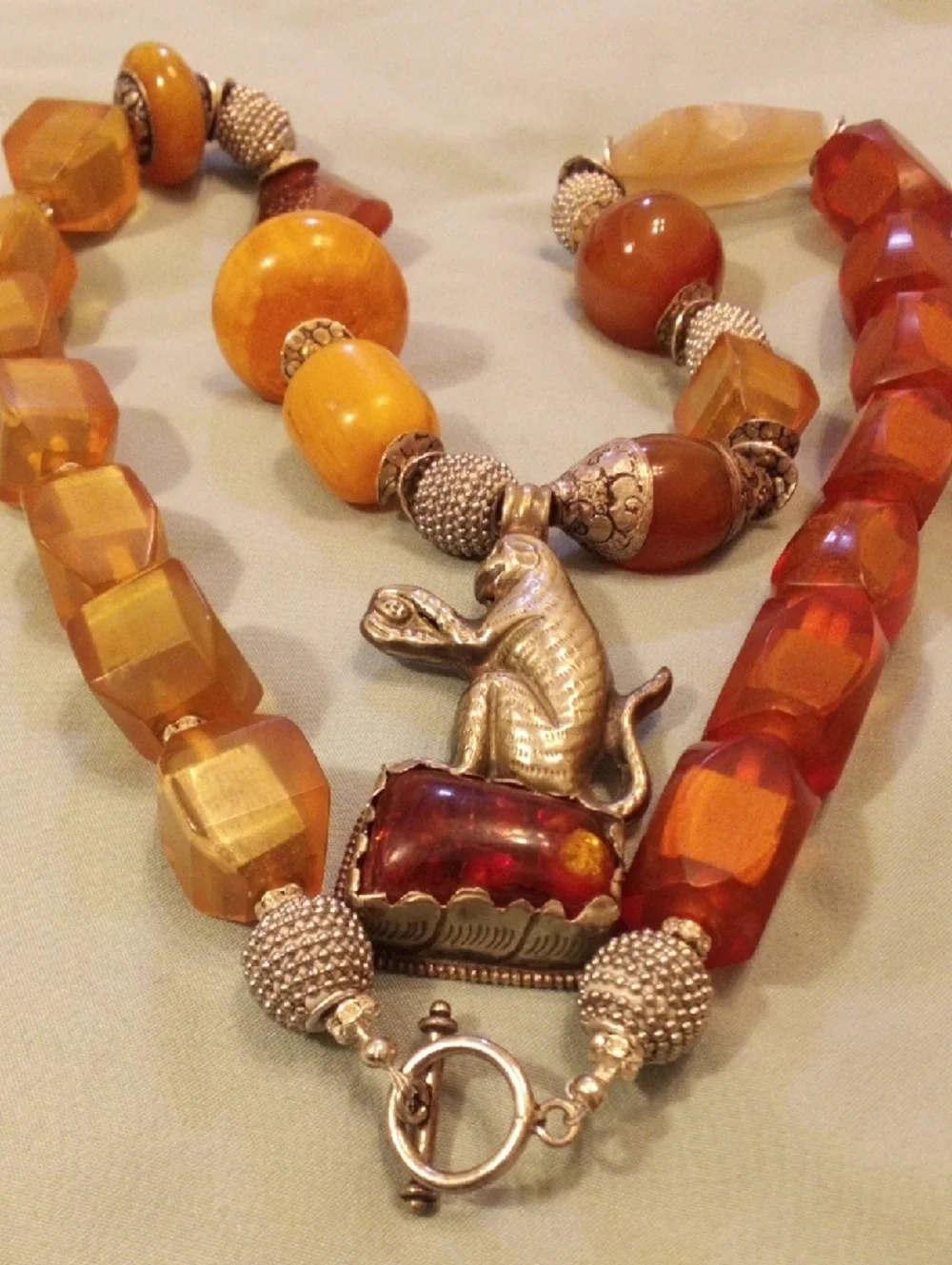 Real Amber-Tone Glass Bead Necklace with Silver Monkey Pendant